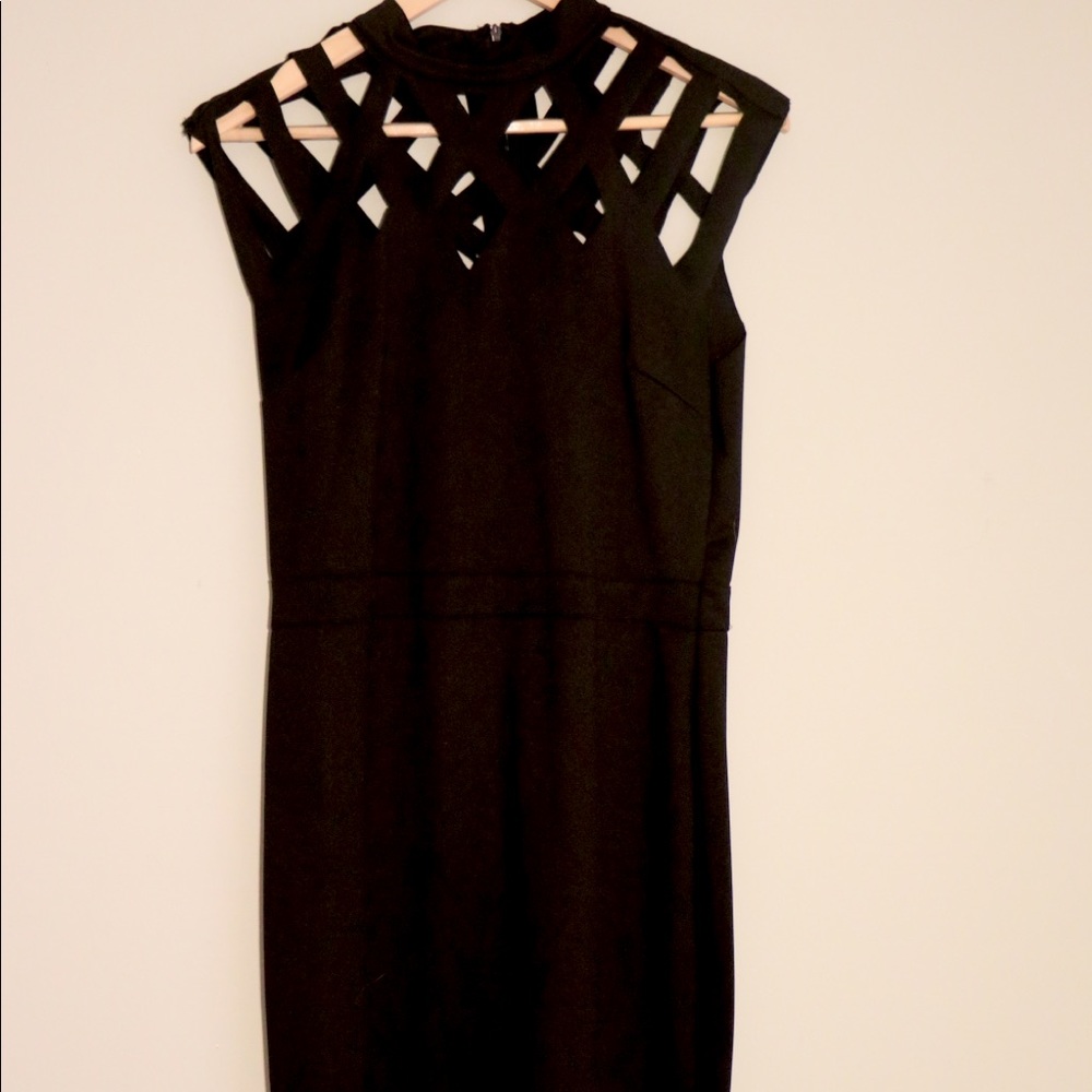 Black mini dress with cut out collar.